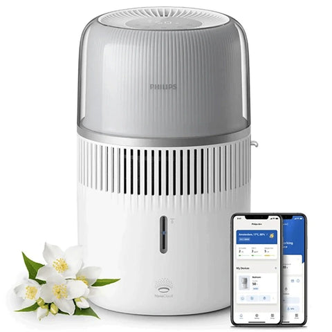 Philips smart air humidifier and aroma diffuser shown with mobile app control and fresh white flowers